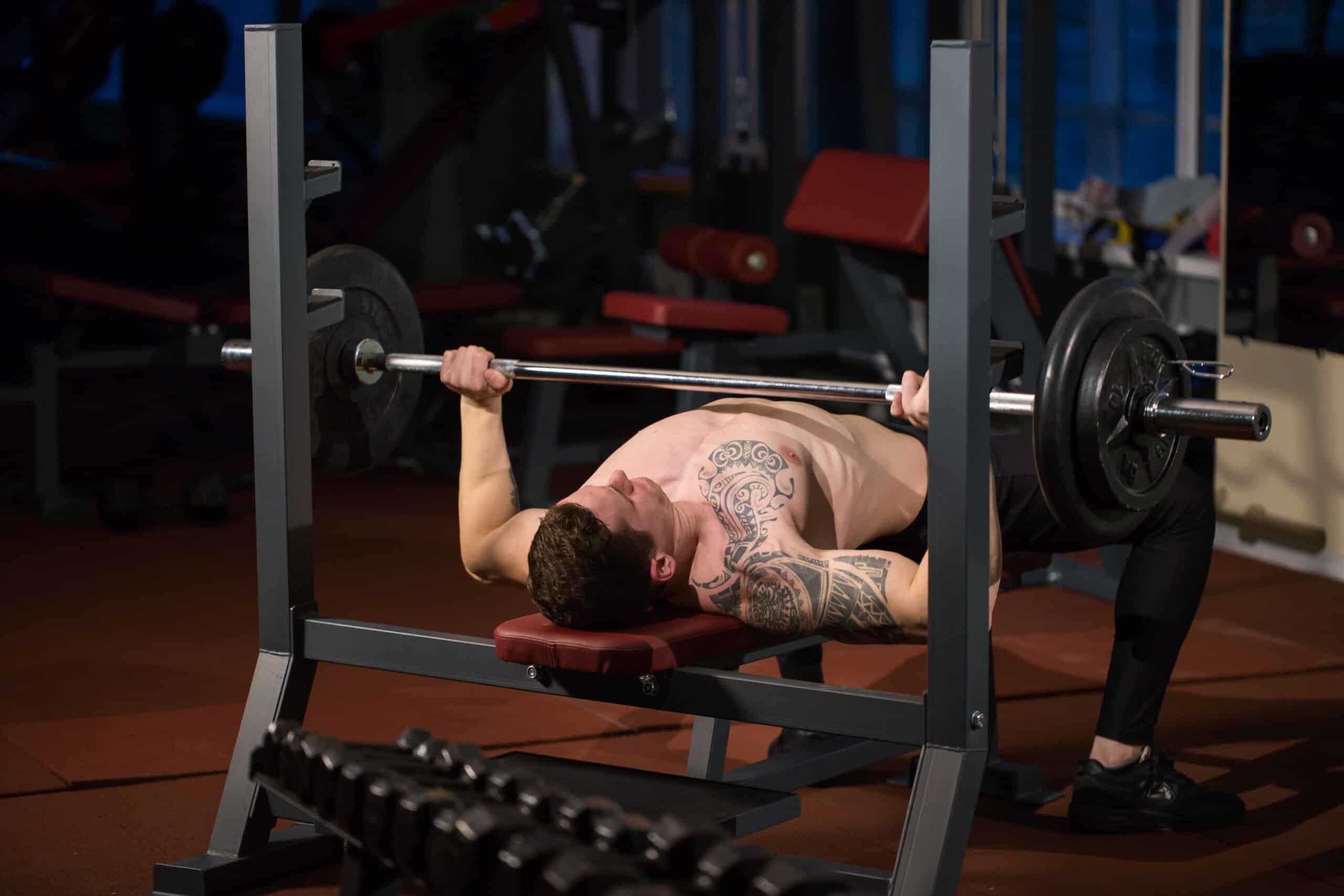 man preparing to bench press